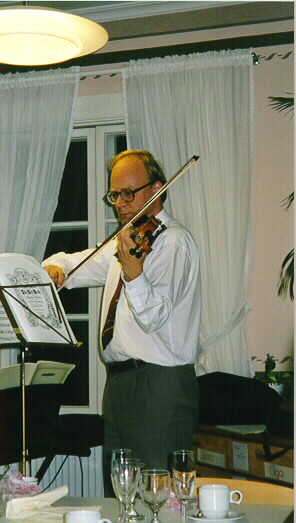 Me playing my daughter's violin.